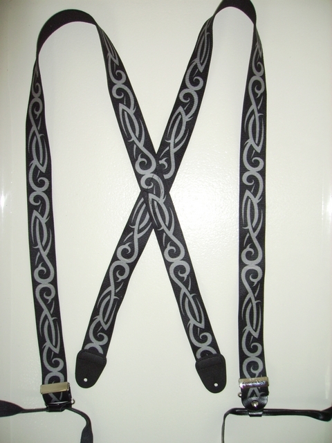 1 1/2" & 2” wide. "X" Style. BUTTON-ON. Choose from Assorted SIZES from 5' 1" to 6' 2" Height. (42" to 48" long Straps). Cotton/Polyester, hand washable-hang to dry Suspenders with Straps that are stretchable for entire length of the material with Genuine Leather ends and 2 Strong Chrome Length Adjusters. TRIBAL SILVER AND GREY